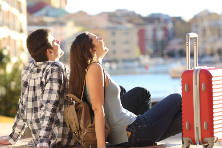 Side,View,Of,A,Couple,Of,2,Tourists,With,A