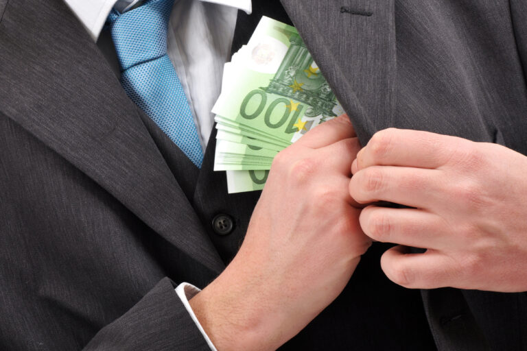 Businessman,Is,Putting,Euros,Banknotes,Money,In,Pocket,Of,His