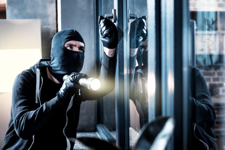 Burglary.,Skilful,Professional,Masked,Burglar,Opening,A,Window,And,Holding