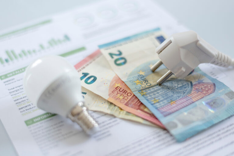 A,White,Electric,Cap,,A,Light,Bulb,And,Euro,Banknotes