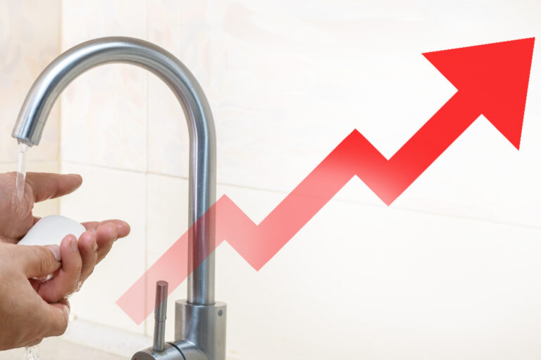 Rising,Water,Prices.,Man,Washing,Her,Hands,And,Red,Growing