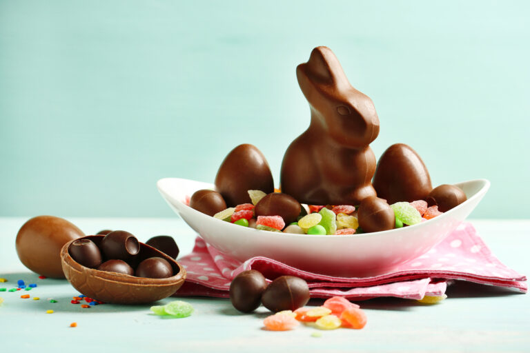 Chocolate,Easter,Eggs,And,Rabbit,On,Plate,,On,Color,Wooden