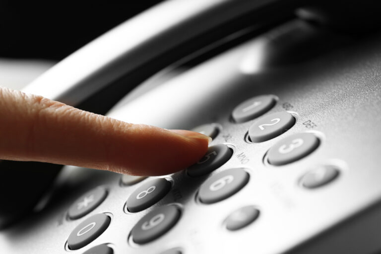 Finger,Pressing,Number,Button,On,Telephone,To,Make,A,Call,