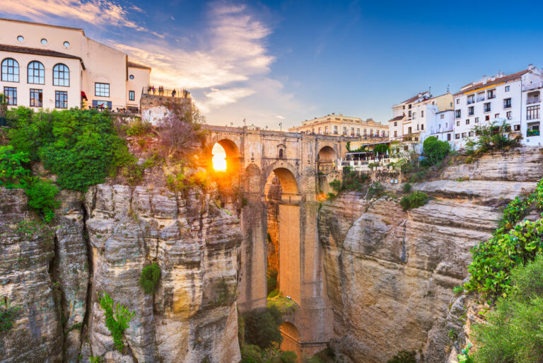 Ronda,,Spain,At,Puente,Nuevo,Bridge,At,Sunset.