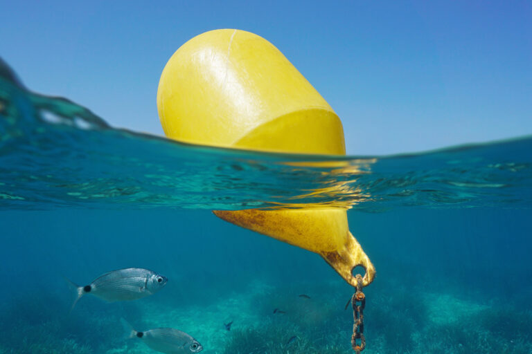 A,Yellow,Beacon,Buoy,In,The,Sea,For,Beach,Marking