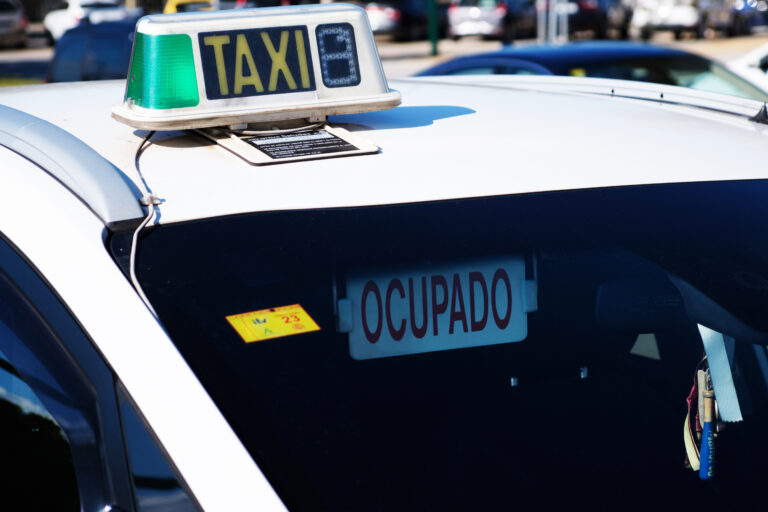M·laga,,Spain;,January,29,,2023:,Taxi,Sign,With,A,Placard