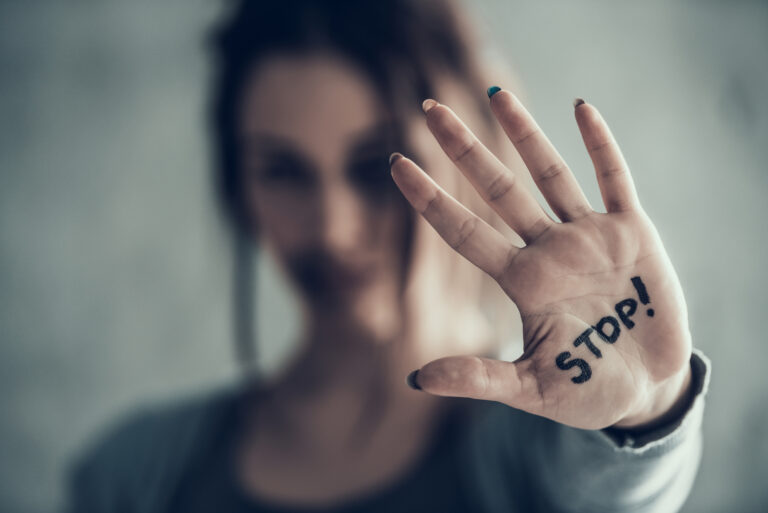 Oppressed,Woman,Shows,By,Hand,Sign,Stop.,Bruises,On,Face.