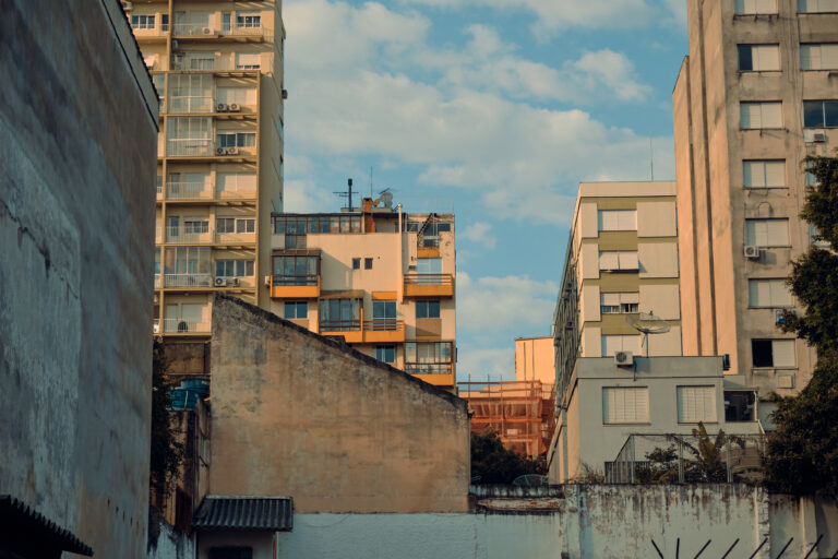 A,Low,Angle,Shot,Of,Buildings,Touching,The,Sky,In