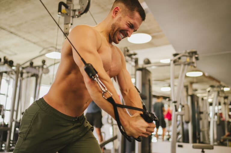 A,Powerful,Shirtless,Muscular,Sportsman,Is,Performing,Hard,Exercises,On