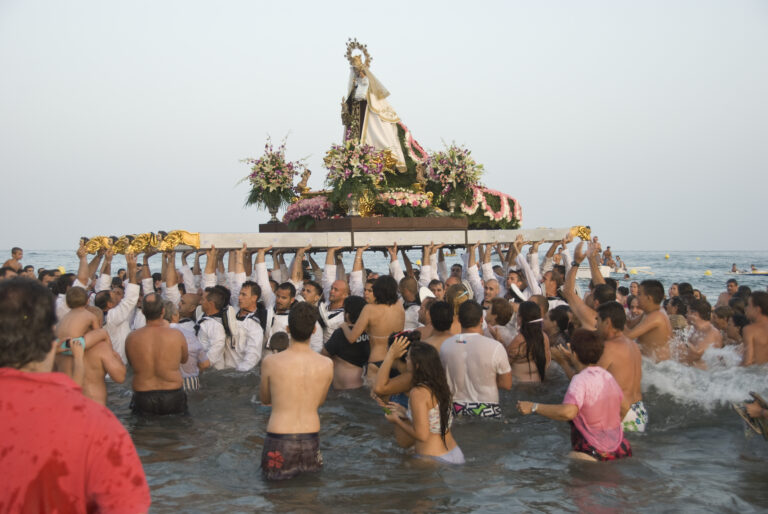 Malaga,,Spain,-,July,16:,Unidentified,Local,Worshipers,Lift,A