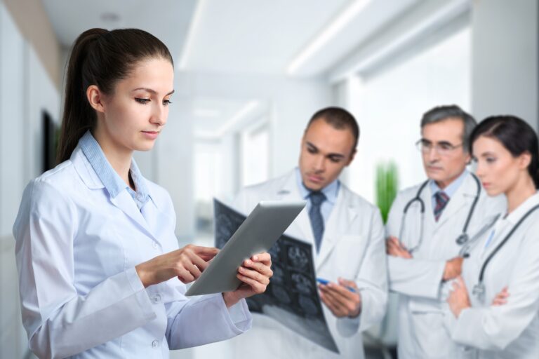 Young,Healthcare,Doctor,Hold,Digital,Tablet,For,Research