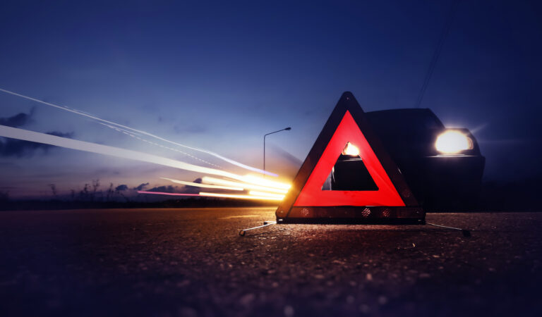 Red,Emergency,Stop,Sign,(red,Triangle,Warning,Sign),With,Long-exposure