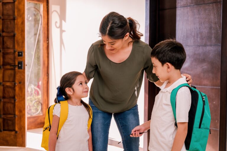 Beautiful,Loving,Latin,Mother,With,Her,Children,At,The,Door