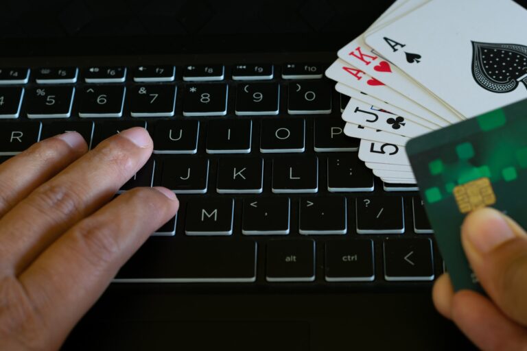 Cards,Kept,On,Keyboard,Hands,Of,A,Person,Payment,For