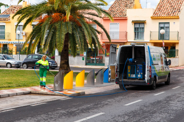 Fuengirola,,Spain,-,May,2018:,Working,Cleaning,Garbage,In,The