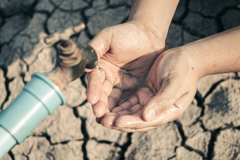 Hand,For,Drinking,Water,To,Live,Through,Drought,,Concept,Drought