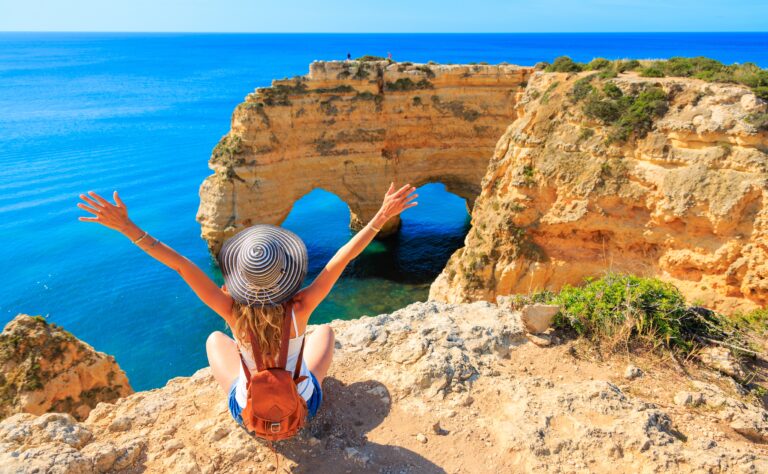 Woman,Tourist,Enjoying,Panoramic,View,Of,Beautiful,Algarve,Heart,Shaped