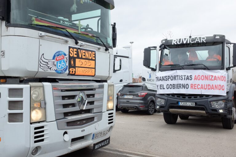 Madrid,,Spain.,24th,March.,2022.,Two,Trucks,Showing,Protest,Signs.