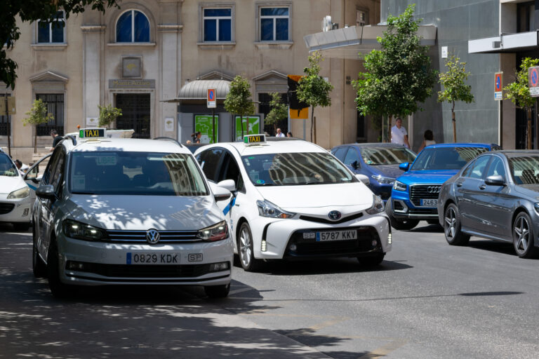 Malaga,,Andalusia,/,Spain,-,August,23,2019.,White,Taxis