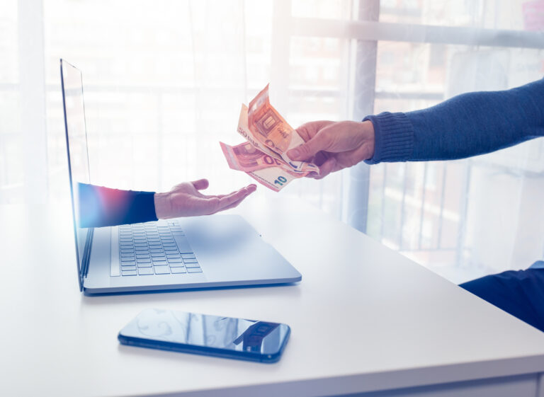 An,Arm,Comes,Out,Of,A,Laptop,To,Extort,Money