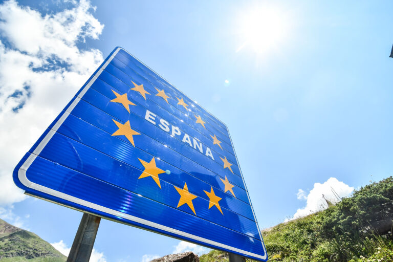 Flag,On,Background,Of,Blue,Sky,,Photo,As,A,Background,