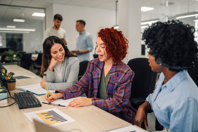 Diverse,Colleagues,Working,In,A,Call,Center.,Focus,On,A