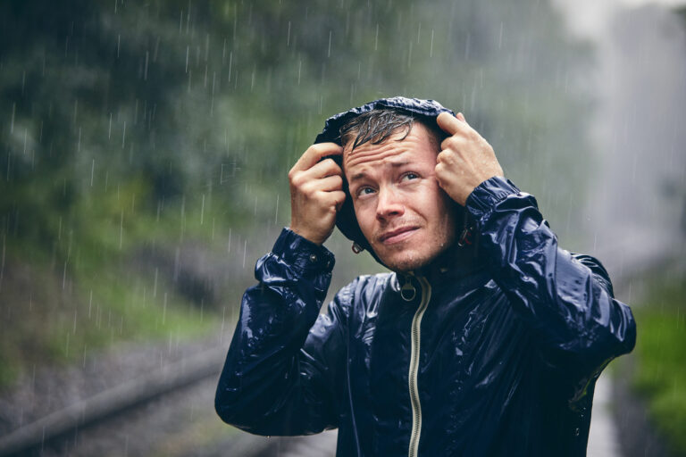 Trip,In,Bad,Weather.,Portrait,Of,Young,Man,In,Drenched