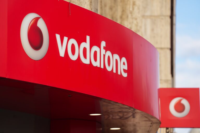 The,Logo,Sign,Of,Vodafone,Telecommunication,Company,On,Top,Of