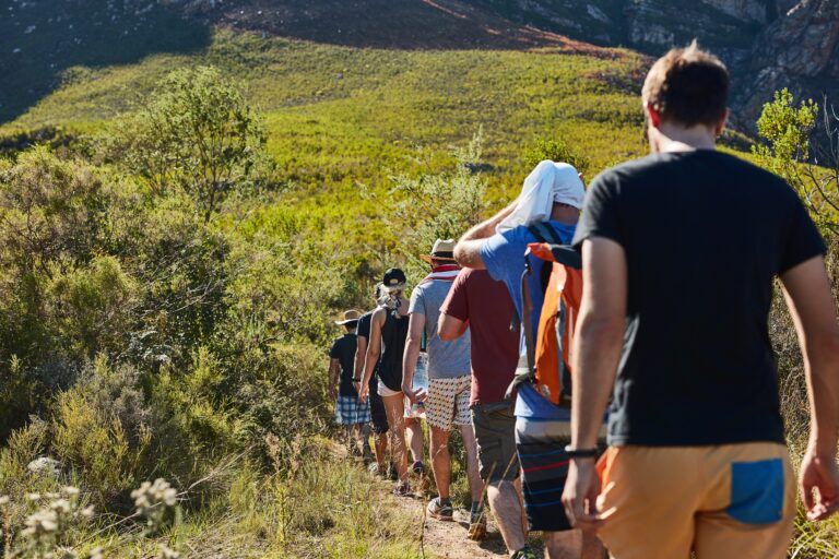 Walking,,Group,And,Back,In,Trip,,Hiking,And,Tour,Guide