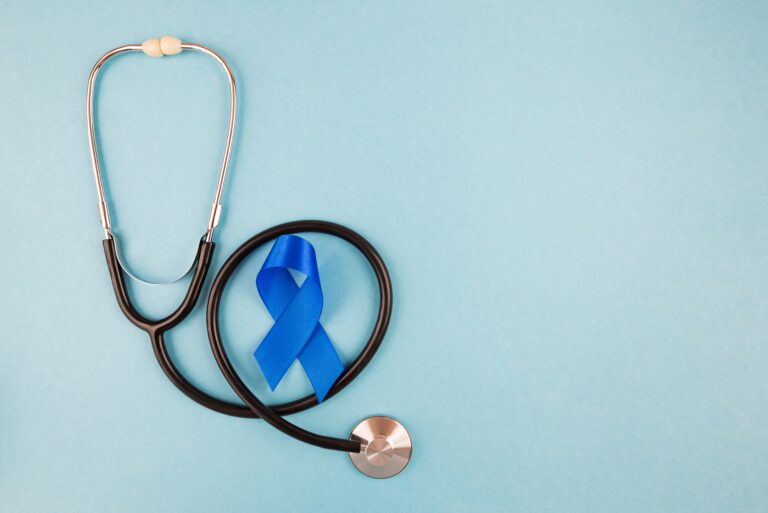 Blue,Ribbon,With,Stethoscope,On,Blue,Background,,Prostate,Cancer,Awareness