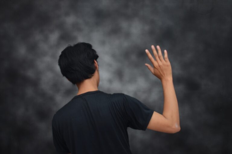 Portrait,Of,A,Man,Saying,Waving,Goodbye,From,Behind,,Sad