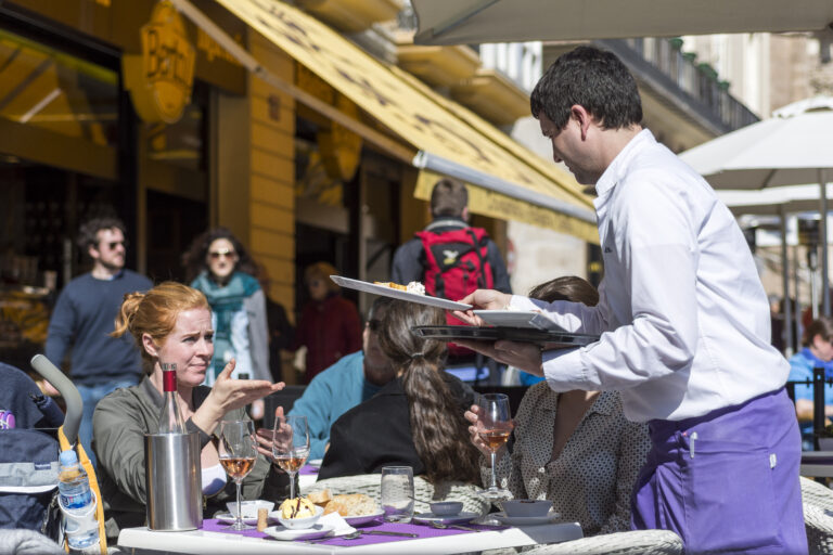 Valencia,,Spain,-,February,20,,2017,:,Waiter,Serving,A