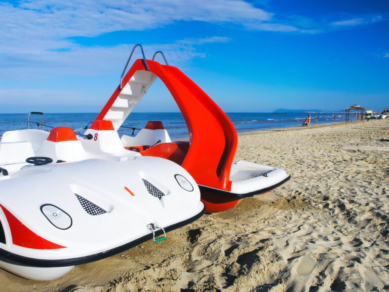 Boats,For,Rest,On,A,Beach.,Italy