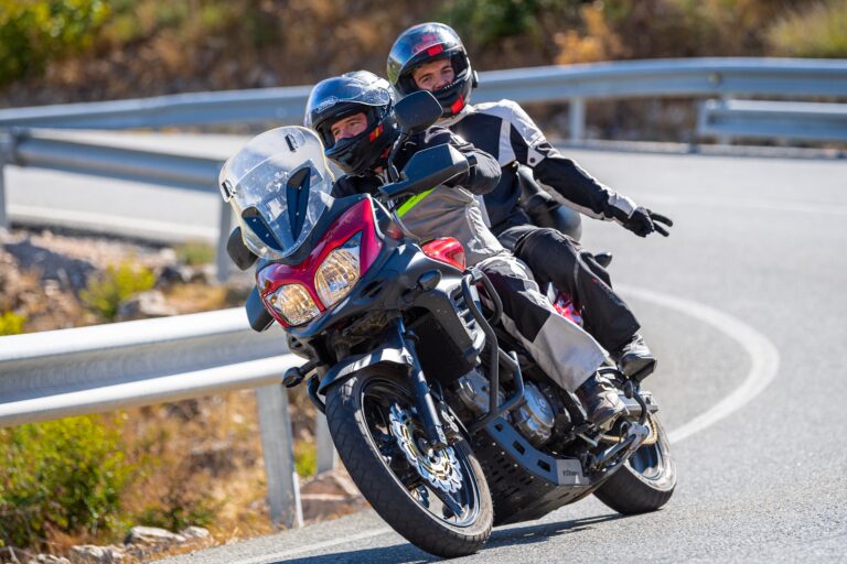 Motorcyclist,On,His,Vehicle,Taking,A,Curve,On,The,Mountain