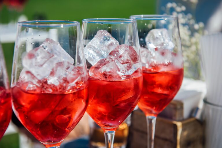 A,Wine,Glass,Filled,With,Ice,Cubes,With,Red,Wine,