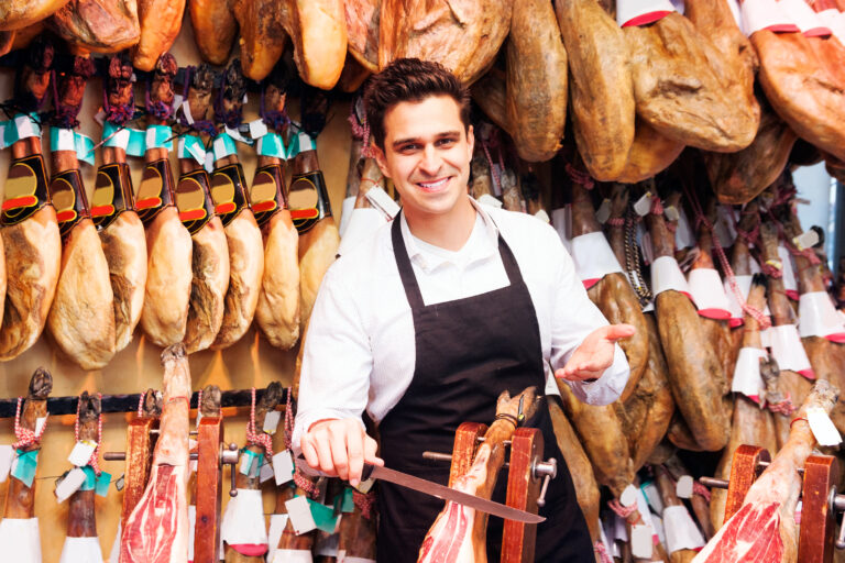 Portrait,Of,A,Smiling,Salesperson,In,The,Store,Jamon