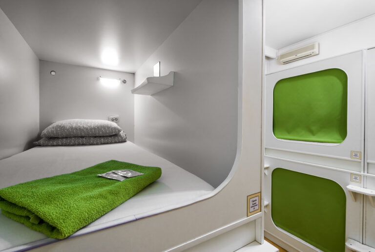 Interior,Of,Capsule,Hotel,In,Residential,Building.,Capsule,Hotels,Are