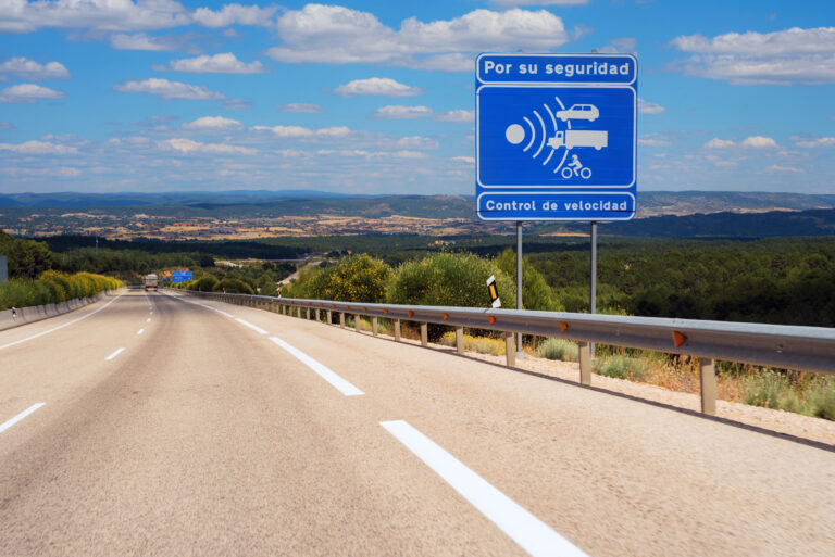Warning,Radar,Sign,In,Spanish,Highway.