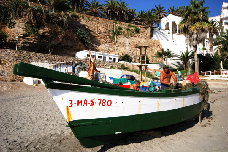 Nerja,,Spain,-,October,06,,2009,-,A,Fisherman,Tending