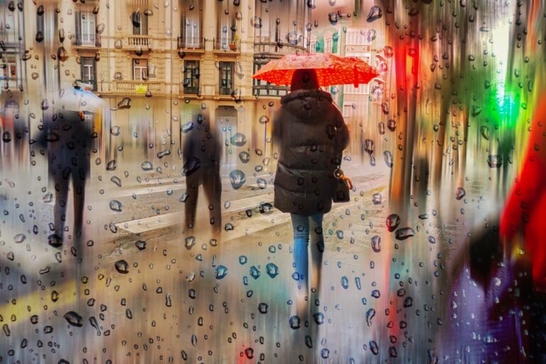 Pedestian,With,An,Umbrella,In,Rainy,Days,In,Bilbao,City,