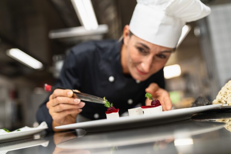 Chef,Perfecting,A,Gourmet,Dessert,Adding,Green,Topping,Finishing,Dish,