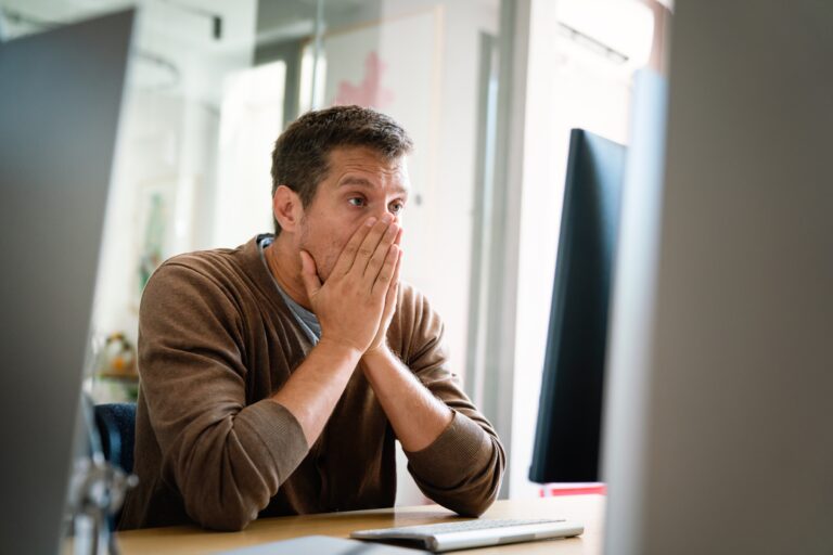 Portrait,Of,A,Disappointed,Man,Programmer,Looking,Stressed,Out,While