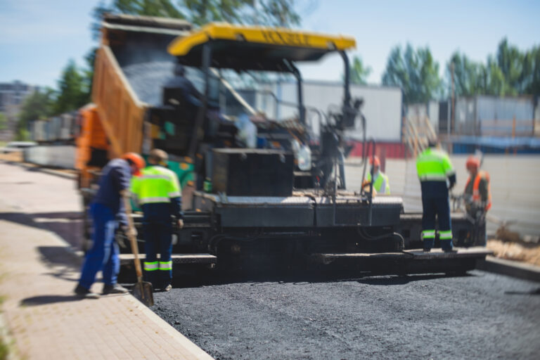 Asphalt,Paver,Machine,And,Steam,Road,Roller,During,Road,Construction
