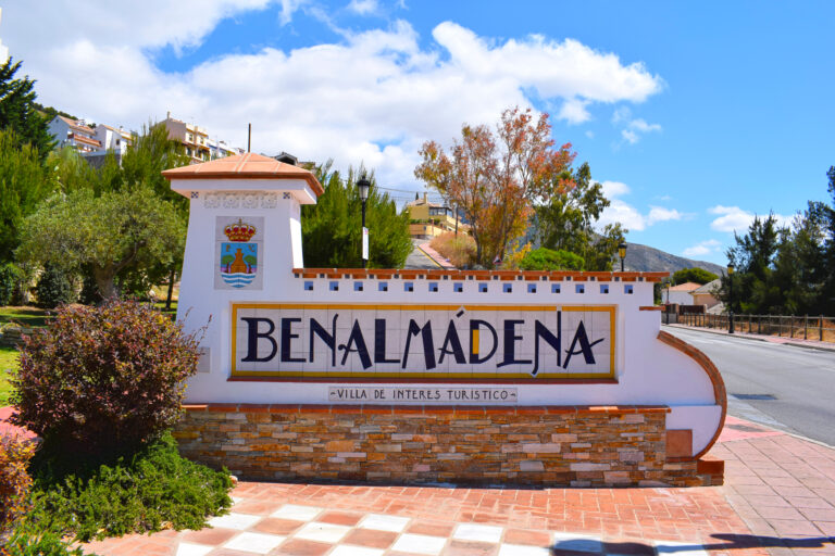 Entrance,Sign,Of,Benalmadena,Pueblo,,"villa,De,Interes,Turistico",Means