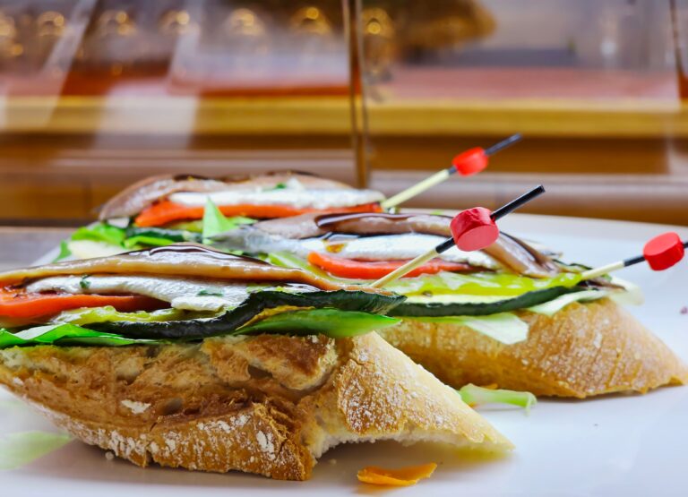 Appetizing,Spanish,Tapas,With,Anchovies,And,Green,Vegetables,With,Wooden