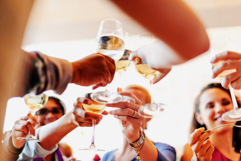 Group,Of,People,Toasting,With,Wine,Glasses,,Celebrating,Together.,Diverse