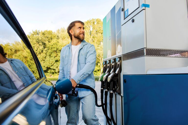 Handsome,Man,Refueling,Auto,At,Modern,Petrol,Station,Standing,Near