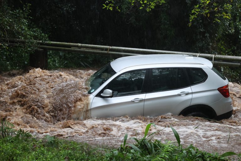 Vehicle,Caught,In,Flooded,Water