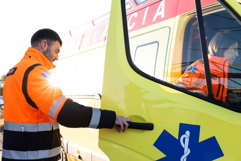 Doctor,And,Nurse,Getting,Into,The,Ambulance,To,Go,To