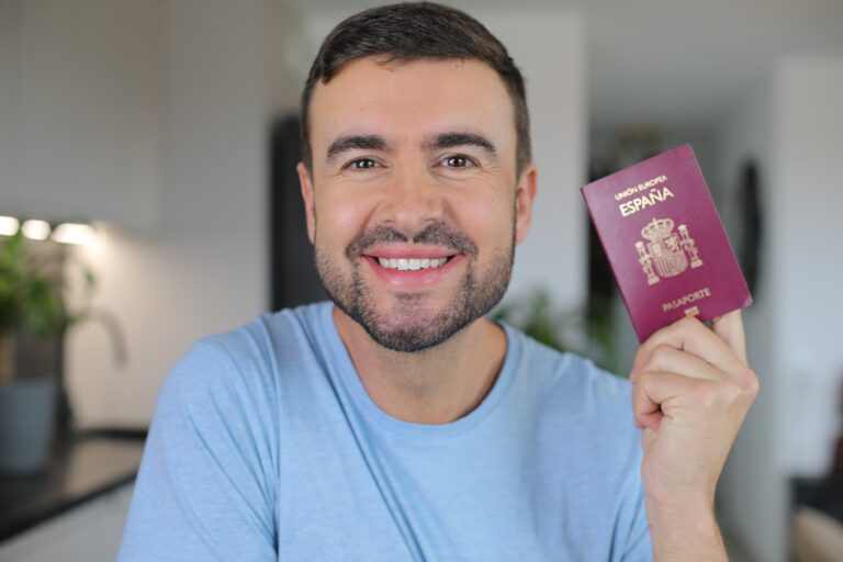 Man,Holding,A,Spanish,Passport